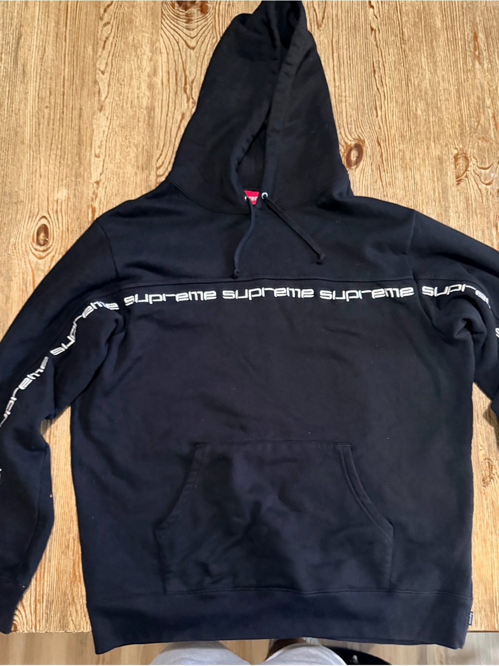 Supreme Black Hoodie with White Repeating Logo Stripe